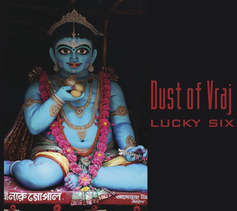 Lucky Six album cover: blue Gopal deity holding sweets, garlanded in roses, beside the title in red type